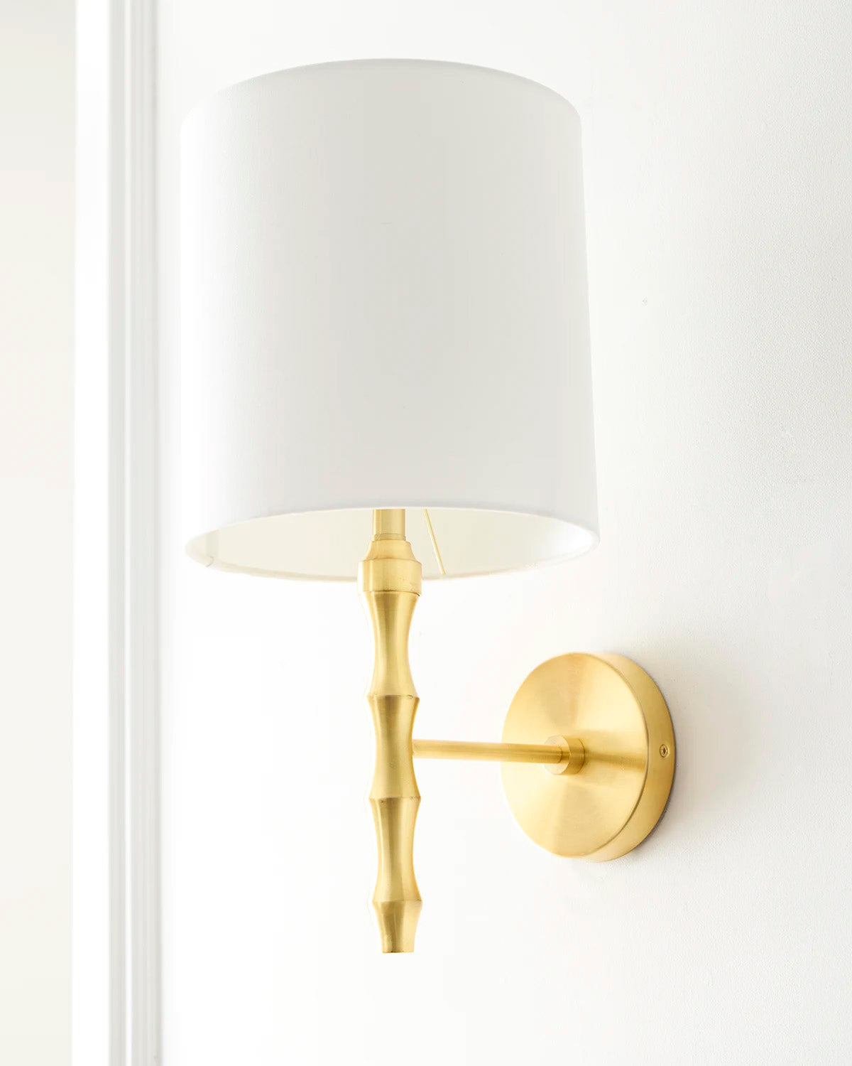 Brass bamboo wall sconce